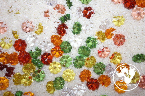 Pumpkin rice Sensory Bin - a simple rice sensory bin with pumpkins for a small sensory play for October and November - 3Dinosaurs.com