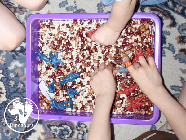 American Revolution Sensory Bin - a simple sensory bin made with beans and plastic figures for the American and British size of the war.  3Dinosaurs.com