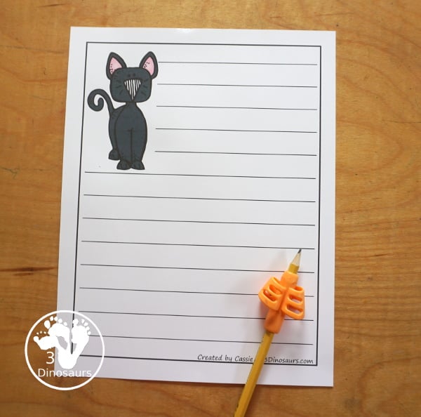 Fun Free Halloween Writing Paper Printables - 10 Halloween pictures and single line and guideline options to pick from. A great way to work on writing for October. 3Dinosaurs.com