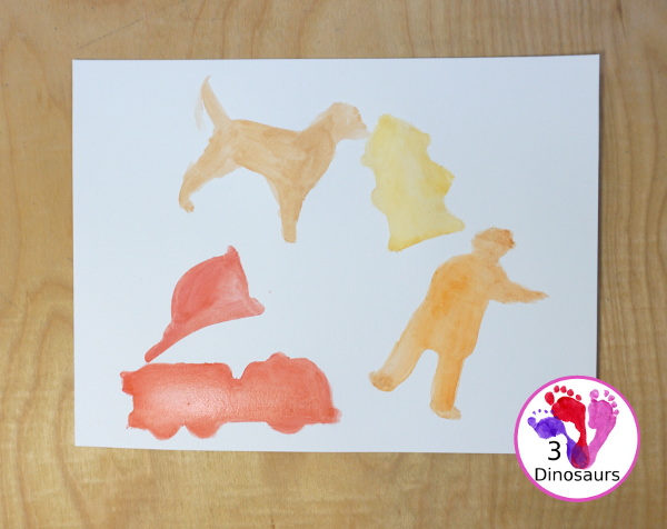 Fire Safety Cookie Cutter Watercolor Painting - a super simple painting activity you can do with kids of different ages. It is a great way to explore the different shapes that are in the cookie cutter sets - 3Dinosaurs.com