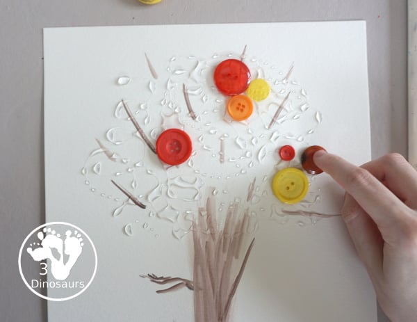 Fall Tree Button Craft a fun fall craft for kids with a watercolor tree and buttons for the red, yellow, and orange leaves. A fun prek and kindergarten craft- 3Dinosaurs.com