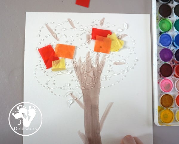 Tissue Paper Fall Tree Craft - a fun mixed art craft with a watercolor tree and then the fall leaves with tissue paper. A simple and easy fall craft to make with kids. - 3Dinosaurs.com