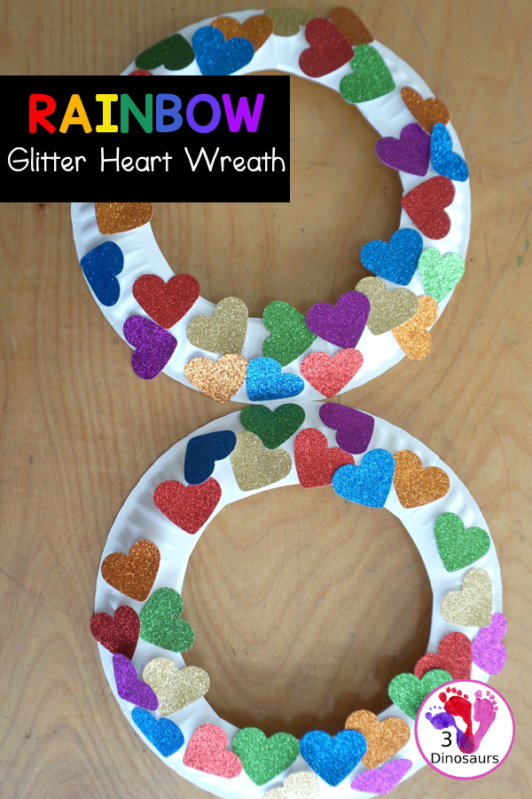 Rainbow Heart Wreath - made with glitter hearts and a paper plate that is super simple to put together for heart theme of Valentines - 3Dinosaurs.com