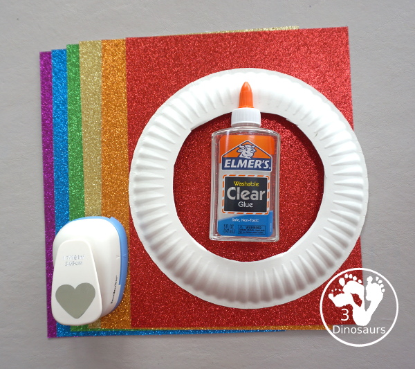 Rainbow Heart Wreath - made with glitter hearts and a paper plate that is super simple to put together for heart theme of Valentines - 3Dinosaurs.com