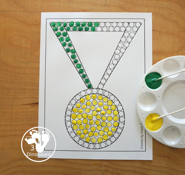 Free Medal Fine Motor Mat Printables - you have four fine motor mats with medal tracing page, medal template printable, q-tip medal page, and a medal dot marker page. Great for any theme with a medal or for the Olympics - 3Dinosaurs.com
