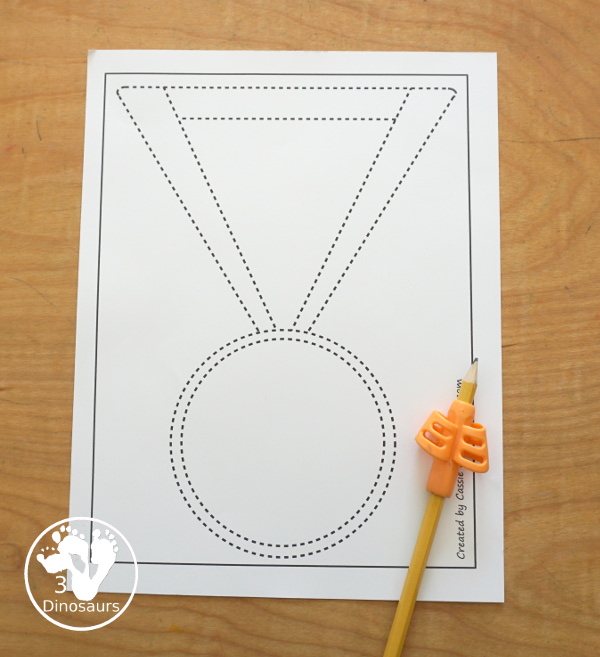 Free Medal Fine Motor Mat Printables - you have four fine motor mats with medal tracing page, medal template printable, q-tip medal page, and a medal dot marker page. Great for any theme with a medal or for the Olympics - 3Dinosaurs.com