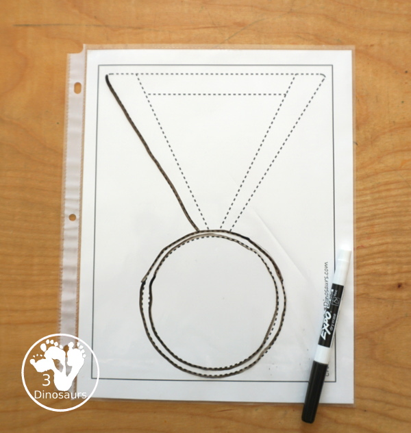Free Medal Fine Motor Mat Printables - you have four fine motor mats with medal tracing page, medal template printable, q-tip medal page, and a medal dot marker page. Great for any theme with a medal or for the Olympics - 3Dinosaurs.com