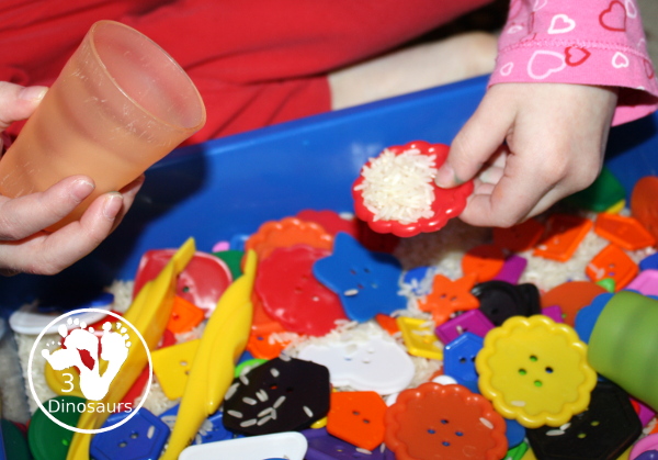 Shape Button Sensory Bin - a simple sensory bin made with rice base and different sizes of shape buttons. An easy shape sensory bin for prek and kindergarten. - 3Dinosaurs.com