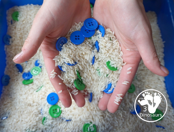 Blue & Green Button Sensory Bin for Earth Day -  you have a simple sensory bin with a rice filler with blue and green sensory bins.  - 3Dinosaurs.com
