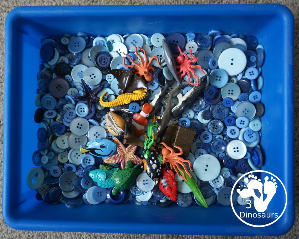 Ocean Button Sensory Bin - a simple and fun sensory bin with button for the filler and ocean animals, A great summer sensory bin that is easy to set up. - 3Dinosaurs.com