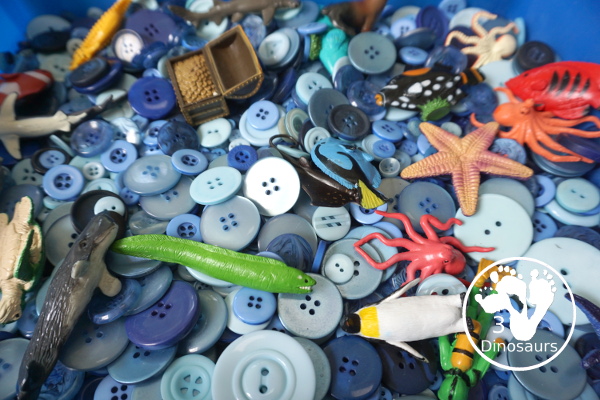Ocean Button Sensory Bin - a simple and fun sensory bin with buttons for the filler and ocean animals, A great summer sensory bin that is easy to set up. - 3Dinosaurs.com
