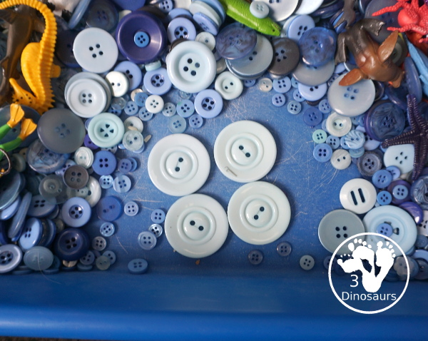 Ocean Button Sensory Bin - a simple and fun sensory bin with buttons for the filler and ocean animals, A great summer sensory bin that is easy to set up. - 3Dinosaurs.com