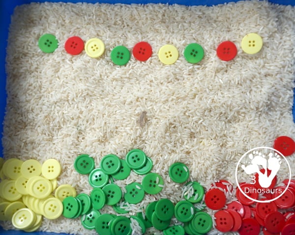 Red, Green & Yellow Button Sensory Bin. A fun button sensory bin that has the same color as apples. A fun fall sensory bin that is easy to set up and fun colors for kids. - 3Dinosaurs.com