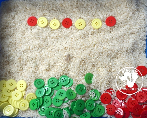 Red, Green & Yellow Button Sensory Bin. A fun button sensory bin that has the same color as apples. A fun fall sensory bin that is easy to set up and fun colors for kids. - 3Dinosaurs.com